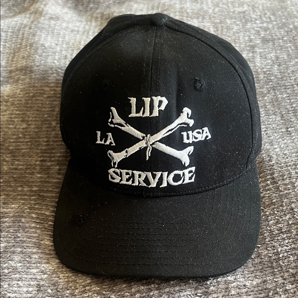 Lip Service Crossbones Snap Back Baseball Cap